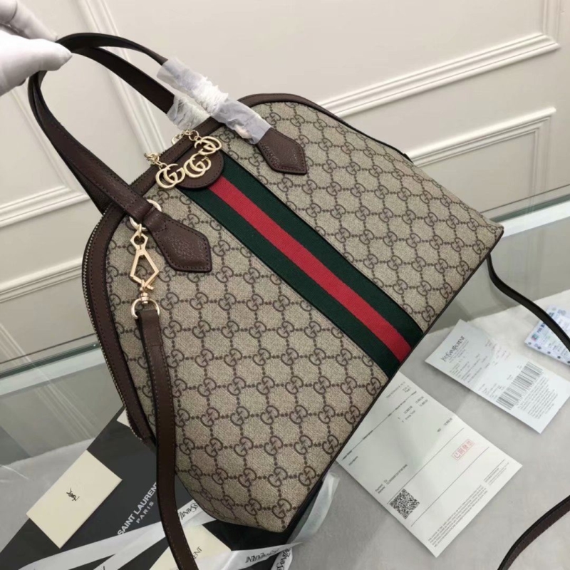 G*u*i top handle bags